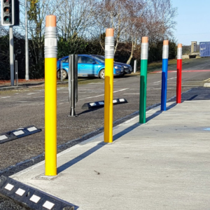 giant pencil bollards near school