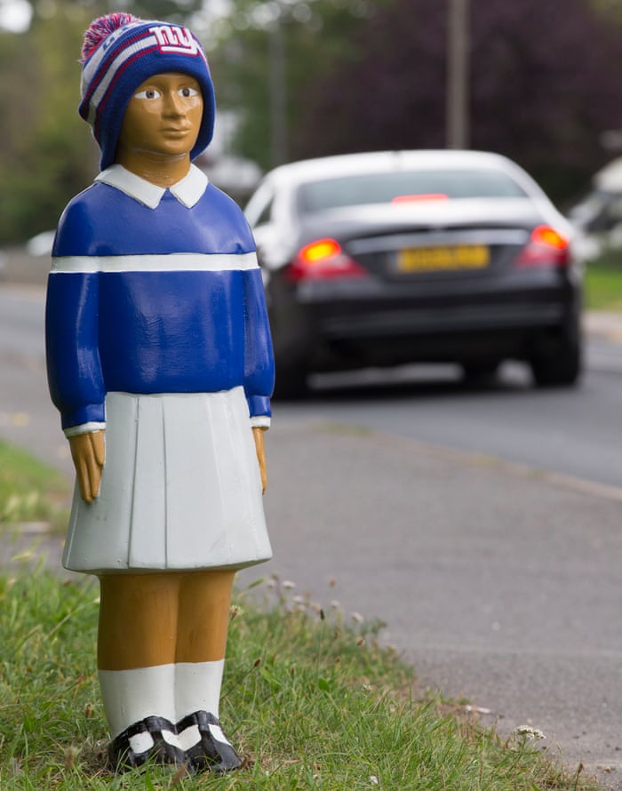 billy bollard on side of road near school